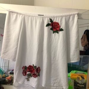 Rose embroidered blouse.